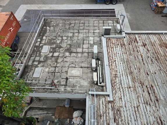 Reinforced concrete roof slab prepared for membrane repair